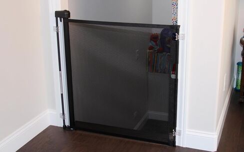 Retract-A-Gate 52 Inch White Retractable Baby and Dog Gate, Made in USA | The original certified retractable gate for top & bottom stairs; 200lb push-out force, angled installs, wide, tall, & sleek in Saudi Arabia