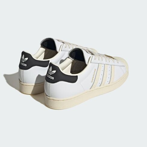adidas Originals Men's Superstar Sneaker, White/Black/Green, 10 in Saudi Arabia