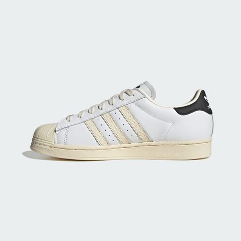 adidas Originals Men's Superstar Sneaker, White/Black/Green, 10 in Saudi Arabia