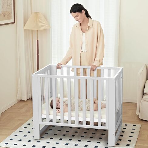 EvoNest Baby Crib, 6 in 1 Convertible Mini Crib with Wheels, 100% New Zealand Pinewood Growing Bed, 4 Adjustable Mattress Height， White in Saudi Arabia