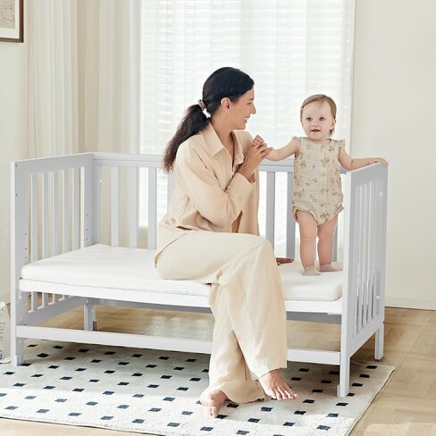 EvoNest Baby Crib, 6 in 1 Convertible Mini Crib with Wheels, 100% New Zealand Pinewood Growing Bed, 4 Adjustable Mattress Height， White in Saudi Arabia