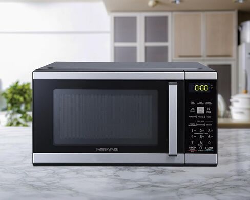 Farberware 1.1 Cu. Ft. 1000-Watt Microwave Oven Digital Control, 10 Power Levels, One-Touch Cooking, Defrost, Child Safety Lock, Black in Saudi Arabia