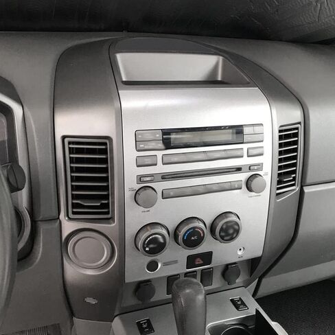 GRAND ORANGE Center Dash Radio Ac Bezel w/o Speaker Bezel Compatible with 2004-2006 Nissan Titan, Armada SE & XE WITHOUT Center Speaker Gray 682578S800 in Saudi Arabia
