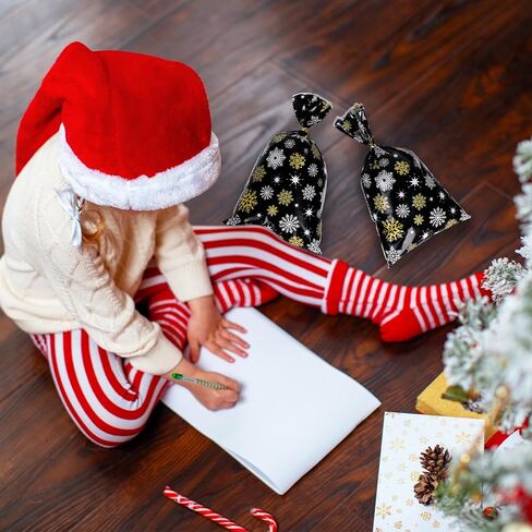 Whaline 100 Pcs Christmas Cellophane Bags with 100 Gold Twist Ties, Xmas Clear Candy Cookie Treat Bags for Christmas Party Supplies (Snowflake) in Saudi Arabia