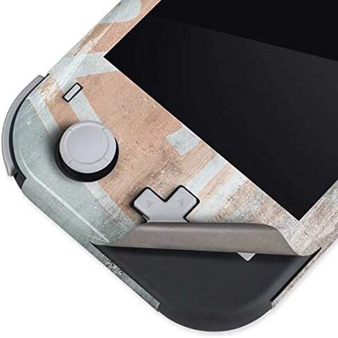 Skinit Scenit Gaming Gaming Skin متوافق مع Nintendo Switch Lite - مرخص رسميًا لتصميم ملصق العدالة (2017) Wonder Woman in Kuwait