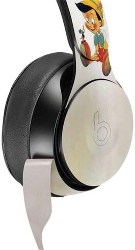 Skinit Skinit Audio Audio Skin متوافق مع Beats Solo Pro - تصميم صورة Disney Pinocchio المرخص رسميًا in Kuwait