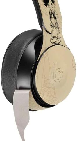 Skinit Skinit Audio Audio Skin متوافق مع Beats Solo Pro - تصميم صورة Disney Pinocchio المرخص رسميًا in Kuwait
