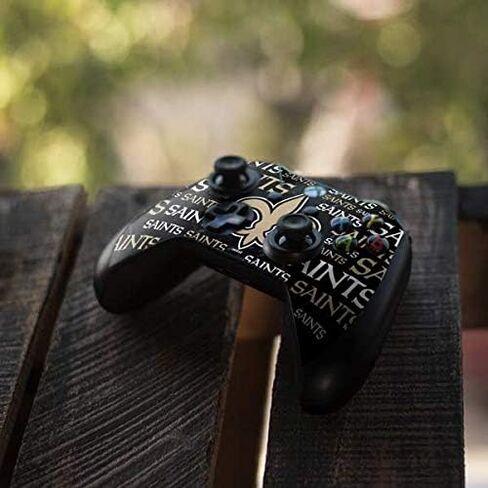 Skinit Skinit Gaming Gaming Skin متوافق مع جهاز التحكم Xbox One X - NFL NEF New Orleans Saints Design Black Blast in Saudi Arabia