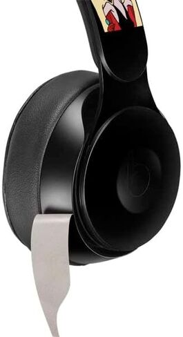 Skinit Skinit Audio Audio Skin متوافق مع Beats Solo Pro - ديزني الأشرار المرخصة رسميًا Cruella de Vil بالأبيض والأسود in Kuwait