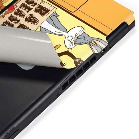 Skinit Decal Gaming Skin Compatible with Nintendo Switch Bundle - Officially Licensed Looney Tunes Rabbit Seasoning Design in Saudi Arabia