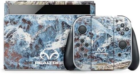 Skinit Decal Gaming Skin Compatible with Nintendo Switch OLED (2021) - Officially Licensed Realtree WAV3 Blue Camo Design in Saudi Arabia