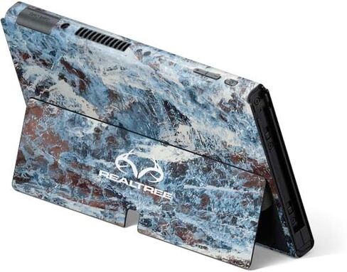 Skinit Decal Gaming Skin Compatible with Nintendo Switch OLED (2021) - Officially Licensed Realtree WAV3 Blue Camo Design in Saudi Arabia