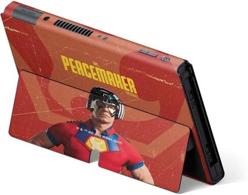 Skinit Decal Gaming Skin Compatible with Nintendo Switch OLED (2021) - Officially Licensed DC Comics Peacemaker Collage Design in Saudi Arabia
