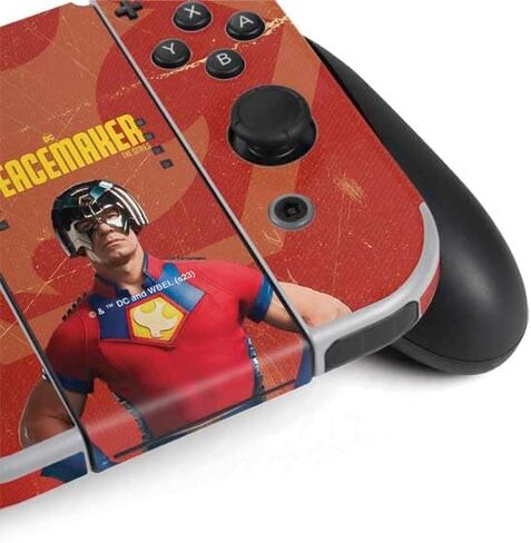 Skinit Decal Gaming Skin Compatible with Nintendo Switch OLED (2021) - Officially Licensed DC Comics Peacemaker Collage Design in Saudi Arabia