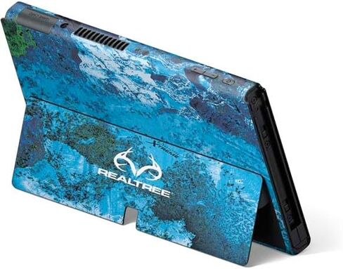 Skinit Decal Gaming Skin Compatible with Nintendo Switch OLED (2021) - Officially Licensed Realtree WAV3 Blue Camo Design in Saudi Arabia