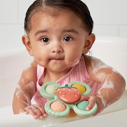 Itzy Ritzy Fidget Toy with Sensory Poppers & Suction Cup; Fidget Toy Sticks to Highchairs, Tables or Tubs While Spinning & Engaging Baby with 4 Textured Poppers, Smile in Saudi Arabia