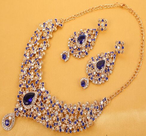 Touchstone Indian Bollywood Traditional Floral Theme White Rhinestone and Blue Faux Sapphire Bridal Designer Jewelry Necklace Set for Women in Antique Gold Tone in Saudi Arabia