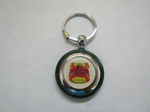القمر الصناعي الغاضب Duster Barracuda Scamp Rapid Transit System Logo Round Round Blastic Keychain - Green in Saudi Arabia