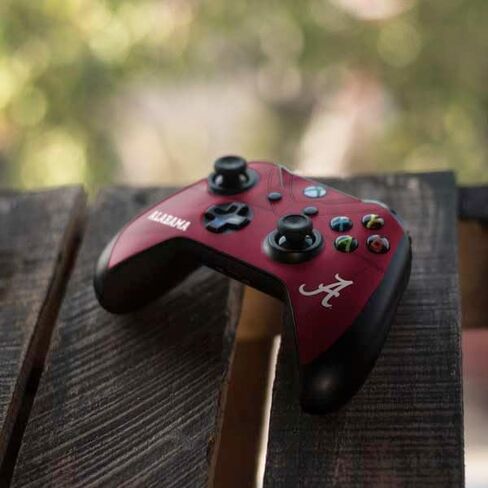 Skinit Skinit Gaming Gaming Continciped مع وحدة تحكم Xbox One X - تصميم جامعة ألاباما مارون جيرسي in Saudi Arabia