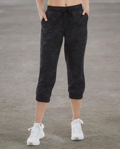 Danskin Women's Cropped Woven Jogger, Black Camo, Medium in Saudi Arabia