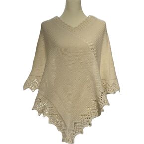 100% Wool Hand knitted Poncho Sweater for Women. Pull over, V-neck design. Lace collar and hem. Oversized silhouette. Easy wear and drape. Comfortable, breathable, natural, warm wool Poncho.
