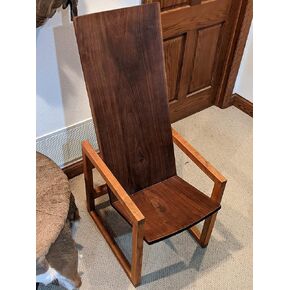 Curved walnut chair