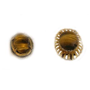 Two Different Bolo Ties with Each Having a Piece of Tiger Eye in the Center. The brown cord varies between the ties as do the gold-plated tips. (Wire Bezel slide)