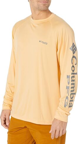Columbia Men's Terminal Tackle Long Sleeve Shirt, Cocoa Butter/City Grey Logo, Large in Saudi Arabia