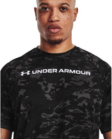 قميص UA Tech ABC Camo فضفاض بأكمام قصيرة للرجال من Under Armour مقاس متوسط in Saudi Arabia