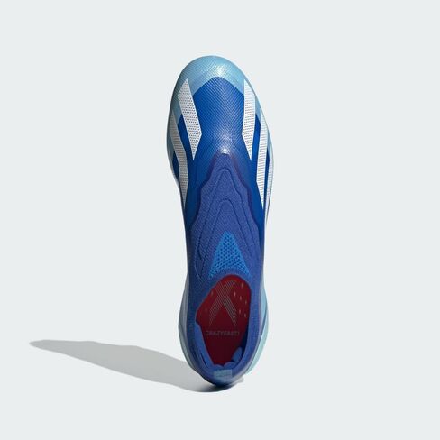 حذاء كرة قدم adidas x Crazyfast.1 بدون رباط للأرضيات الصلبة للبالغين باللون الأبيض السحابي in Saudi Arabia