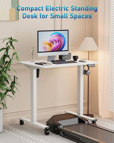 Small Height Adjustable Electric Standing Desk, 31.5" x 23.6" Sit Stand up Desk with Splice Board, Ergonomic Rising Computer Home Office Desk Table with Memory Preset, White Frame/White Top in Kuwait