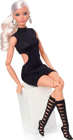 Barbie Basics Model 02 Collector Doll with Blonde Hair, Black Mini Dress & Gladiator Boots, Universal-fit Fashions, Posable Body & Swappable Doll Head in Saudi Arabia