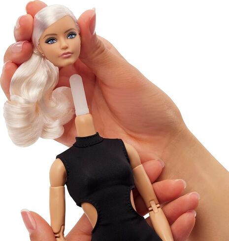 Barbie Basics Model 02 Collector Doll with Blonde Hair, Black Mini Dress & Gladiator Boots, Universal-fit Fashions, Posable Body & Swappable Doll Head in Saudi Arabia