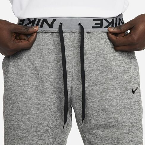 Nike Men's TF Pant Regular (US, Alpha, Medium, Regular, Regular, Midnight Navy/Black) in Saudi Arabia