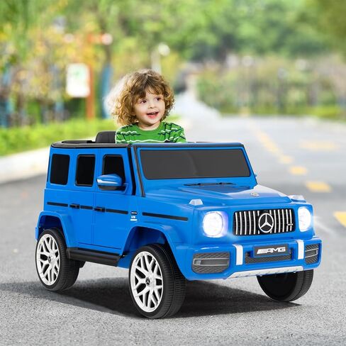 OLAKIDS 12V Kids Ride On Car, Licensed Mercedes Benz G63 Electric Vehicle with Remote Control, Double Open Doors, Music, Bluetooth, 2 Speeds, Wheels Suspension, Battery Powered Driving Toy (White) in Kuwait