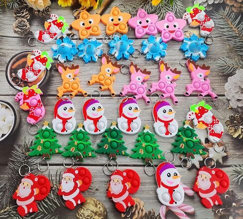 30 Packs Snata Bulk Mini pop Christmas Fidget Gifts for School Holiday Kids Party Favors and Classroom Students Prizes in Saudi Arabia