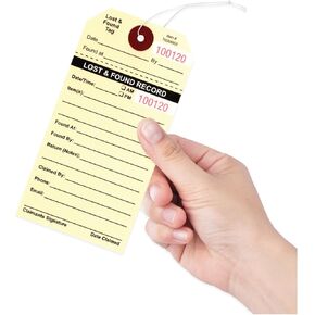 500 Lost & Found Tags with Elastic String Attached. Manila Uncoated Stock Printed in Black with Red Consecutive Numbering. Main Text:-"Lost & Found Record". Tag Size: 5 1/4" x 2 5/8".