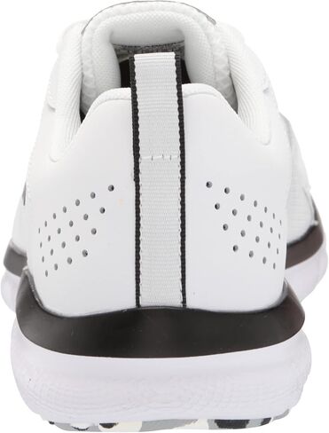 Under Armour Men's Charged Assert 9, (404) Midnight Navy/Yellow Ray/White, 12 in Saudi Arabia