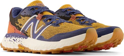New Balance Women's Fresh Foam Hierro V7 Trail Running Shoe, Truffle/Electric Purple, 11 Wide in Saudi Arabia