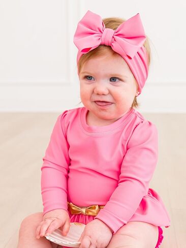 RuffleButts Girls UPF50+ Shimmer Swim Bow Headband in Saudi Arabia
