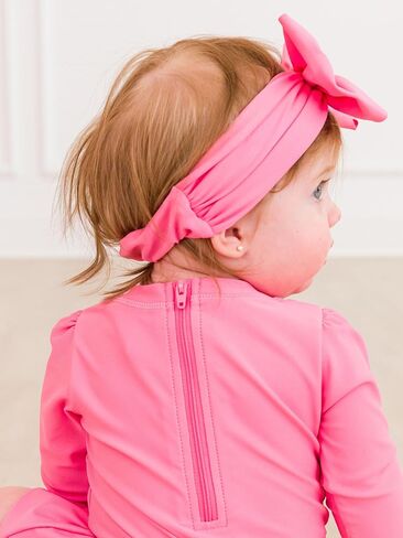 RuffleButts Girls UPF50+ Shimmer Swim Bow Headband in Saudi Arabia