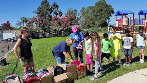 24 Pack Bulk Backpacks with School Supplies for Kids - Trailmaker Wholesale Backpack and School Supplies Kits (Girls Colors Pack) in Kuwait