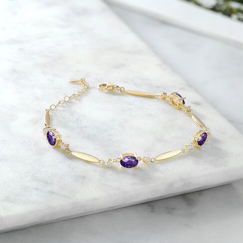 Gem Stone King 18K Yellow Gold Plated Silver Black Onyx and White Moissanite Tennis Bracelet For Women | 3.10 Cttw | Gemstone December Birthstone | Oval 7X5MM | 6 Inch + 1 Inch Extender in Saudi Arabia