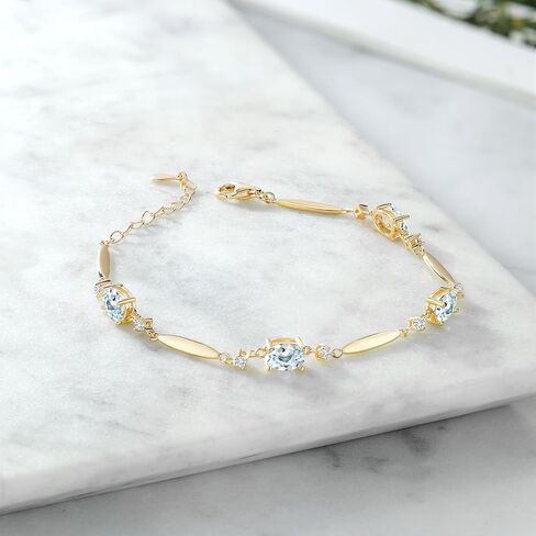 Gem Stone King 18K Yellow Gold Plated Silver Black Onyx and White Moissanite Tennis Bracelet For Women | 3.10 Cttw | Gemstone December Birthstone | Oval 7X5MM | 6 Inch + 1 Inch Extender in Saudi Arabia