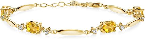 Gem Stone King 18K Yellow Gold Plated Silver Black Onyx and White Moissanite Tennis Bracelet For Women | 3.10 Cttw | Gemstone December Birthstone | Oval 7X5MM | 6 Inch + 1 Inch Extender in Saudi Arabia