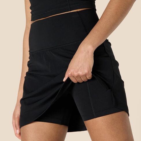 Amazon Essentials Formflex Formflex Buttery Tennis تنورة مع شورتات مدمجة مع جيوب in Kuwait