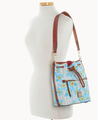 Dooney & Bourke Plumeria Drawstring Bucket Bag/Zip Around Wallet Bundle in Saudi Arabia