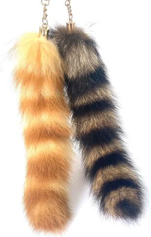 2pcs therian raccoon tail keychain و gold and brown fluffy bag charm و cosplay accessory in Kuwait