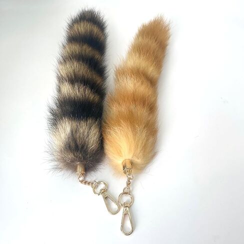 2pcs therian raccoon tail keychain و gold and brown fluffy bag charm و cosplay accessory in Kuwait