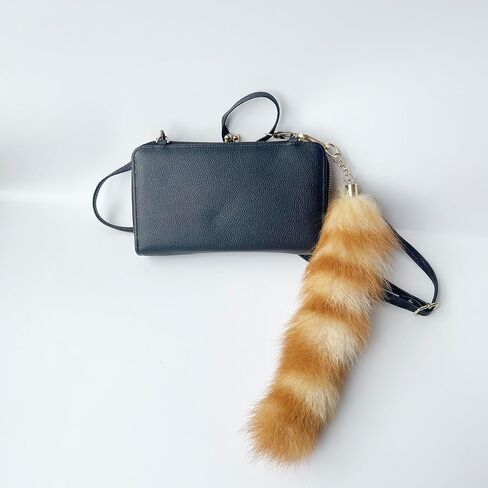 2pcs therian raccoon tail keychain و gold and brown fluffy bag charm و cosplay accessory in Kuwait